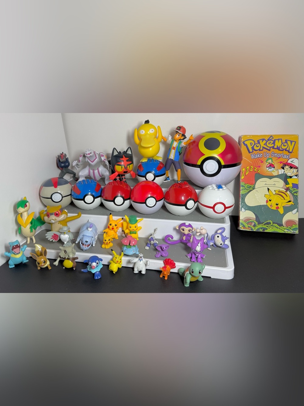 Huge Pokémon Figure & Poké Ball Lot - 25+ Pcs with Vintage VHS Cover